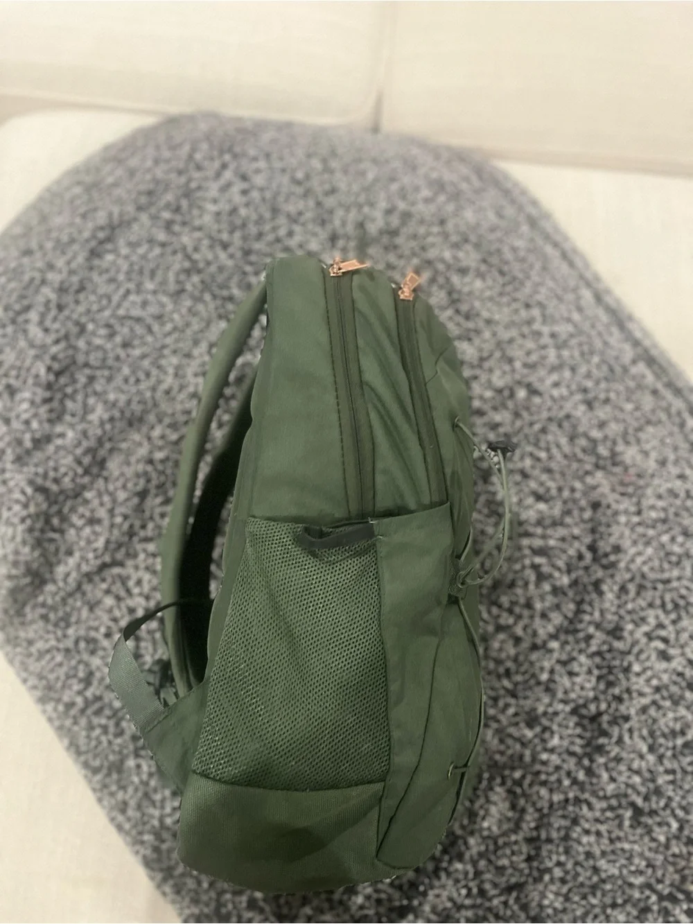 The North Face Jester Backpack in Dark Green with White Logo